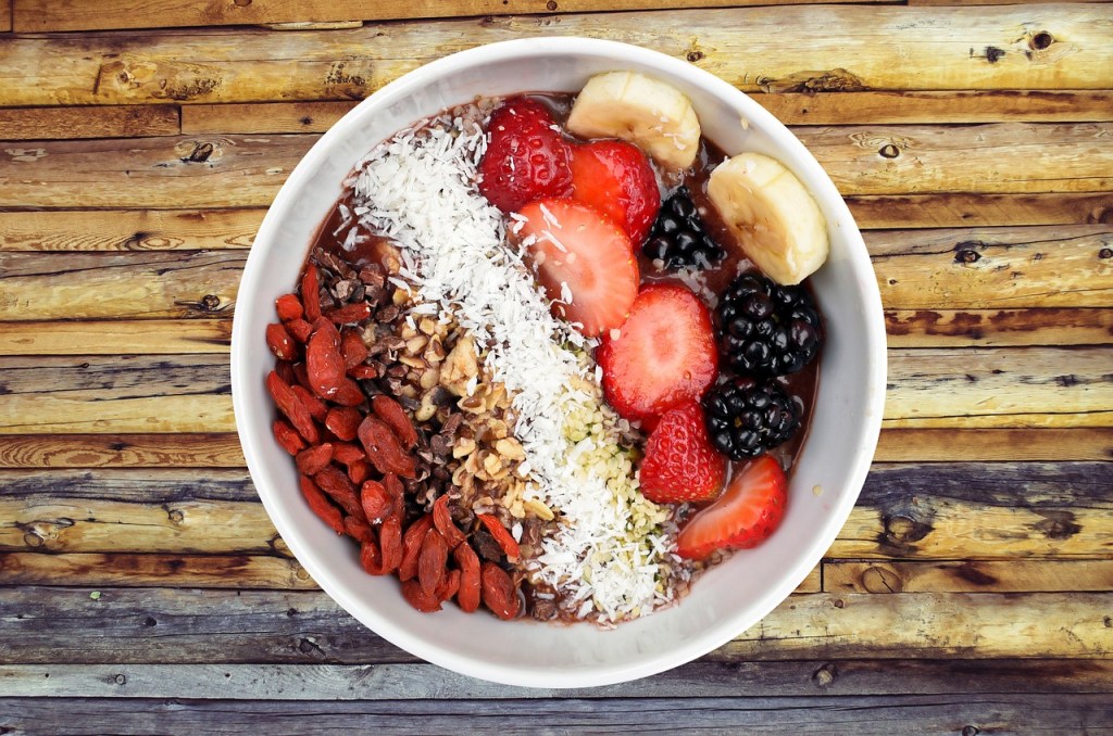 bowl of fruits, oats and nuts